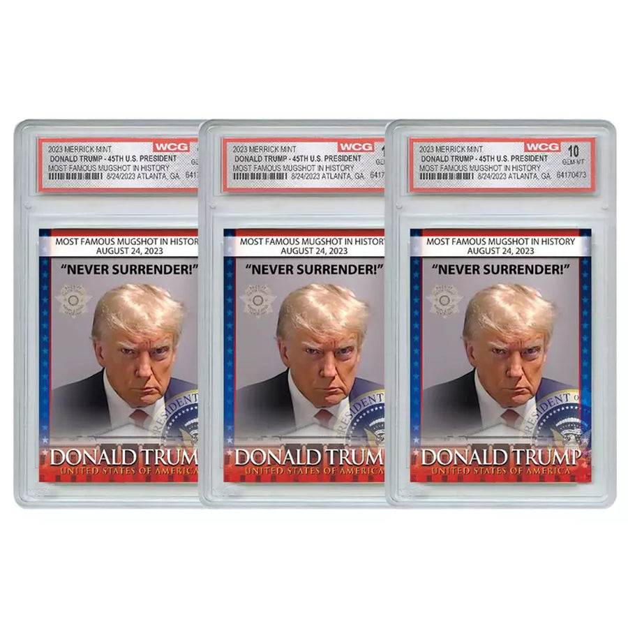 Three graded Trump mugshot Never Surrender trading cards in protective slabs