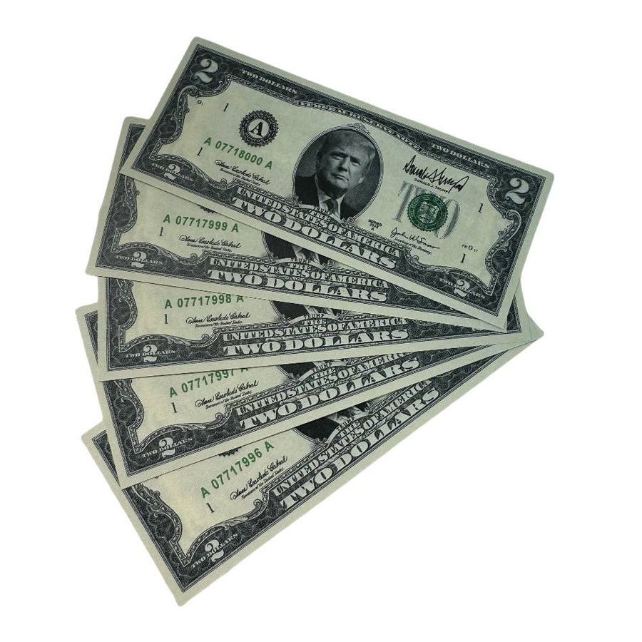 Fanned stack of Trump $2 bills with Trump portrait, front view