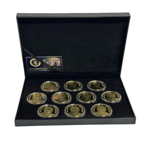 Open Trump Treasure Box displaying ten gold Donald Trump commemorative coins with certificate card