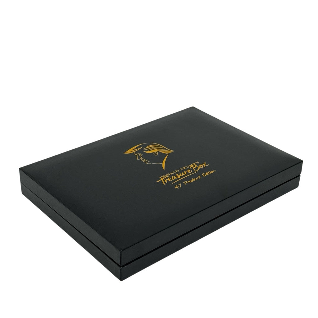 Closed black Donald Trump Treasure Box 47 President Edition with gold logo, angled view
