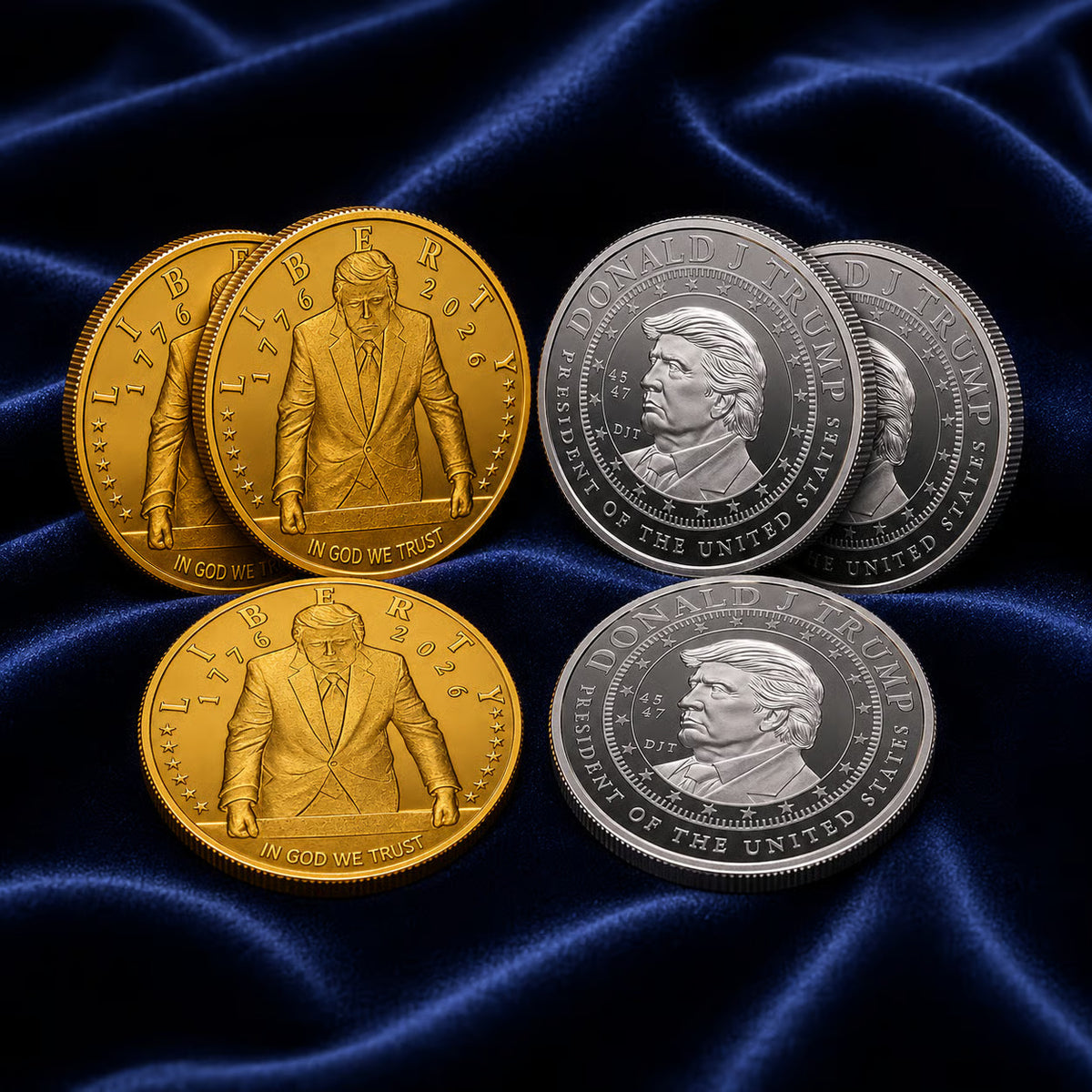 Trump 2026 gold Liberty coins and Donald J Trump silver coins arranged on blue velvet