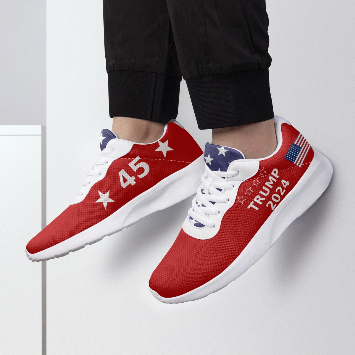 Red Trump 2025 Victory sneakers 47 worn with black pants, showing '45' and 'Trump 2024' with US flag