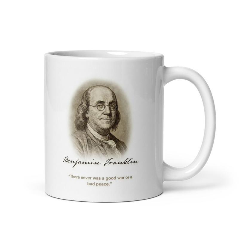 White glossy mug with Benjamin Franklin portrait and good war bad peace quote