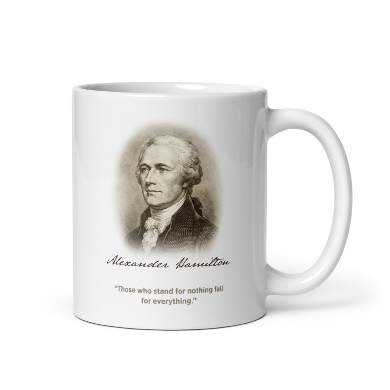 White glossy mug with Alexander Hamilton portrait and quote about standing for nothing