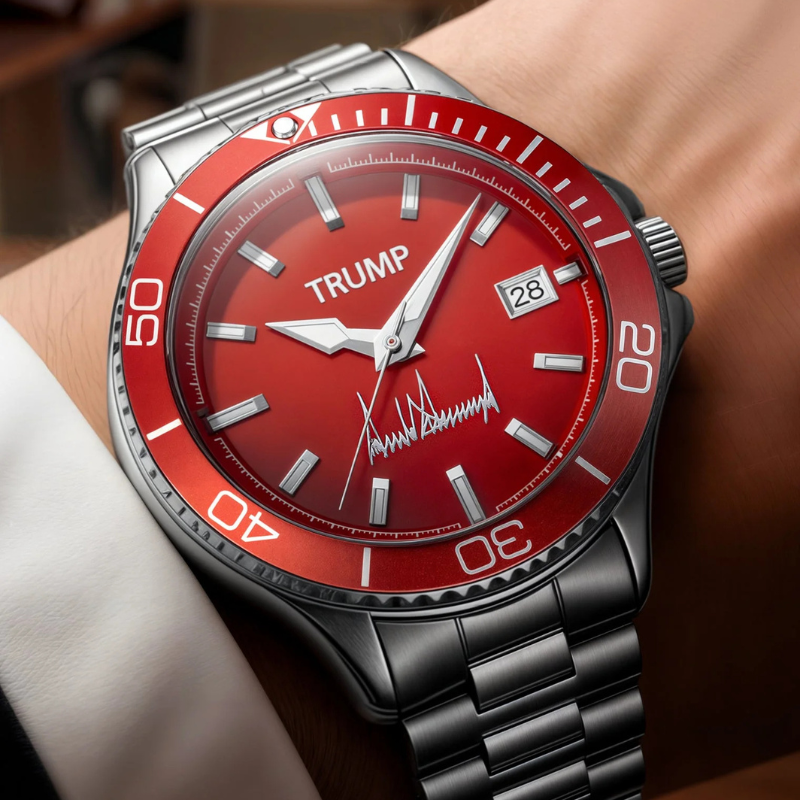 Trump red dial watch with black bracelet worn on wrist, close-up