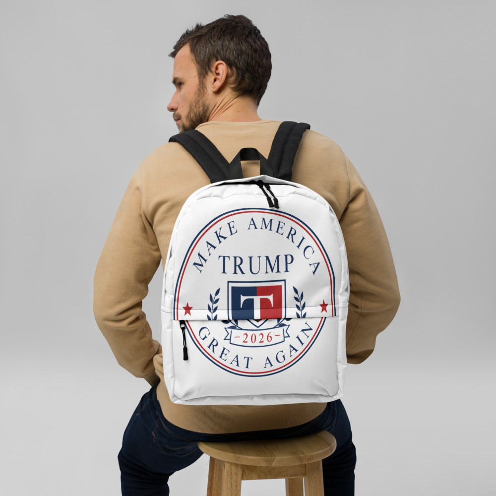 Man wearing white Trump 2026 Make America Great Again backpack with seal logo, back view