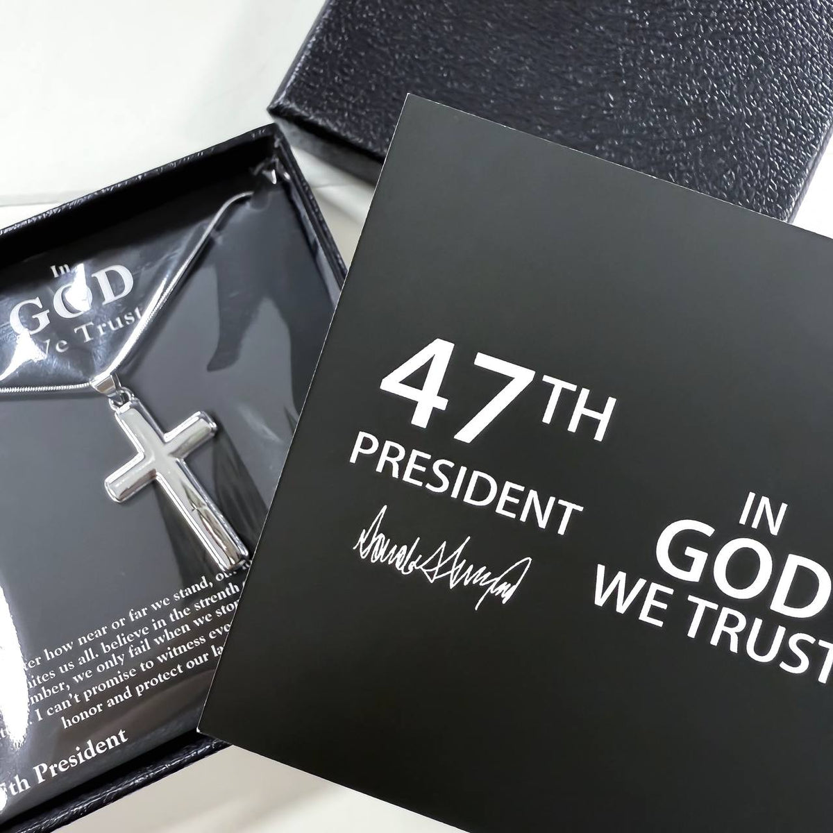 47th President In God We Trust silver cross necklace in open gift box with signature card