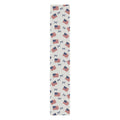 White table runner with repeating American flag and blue bow print